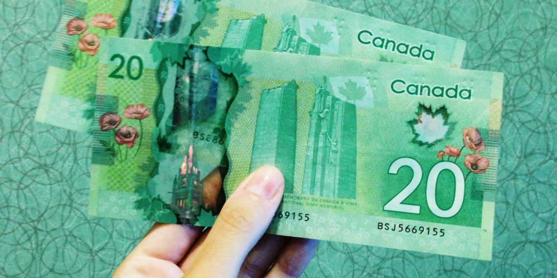 كيفية توزيع مساعدة الـ 500 دولار ومن هو المؤهل لتلقيها